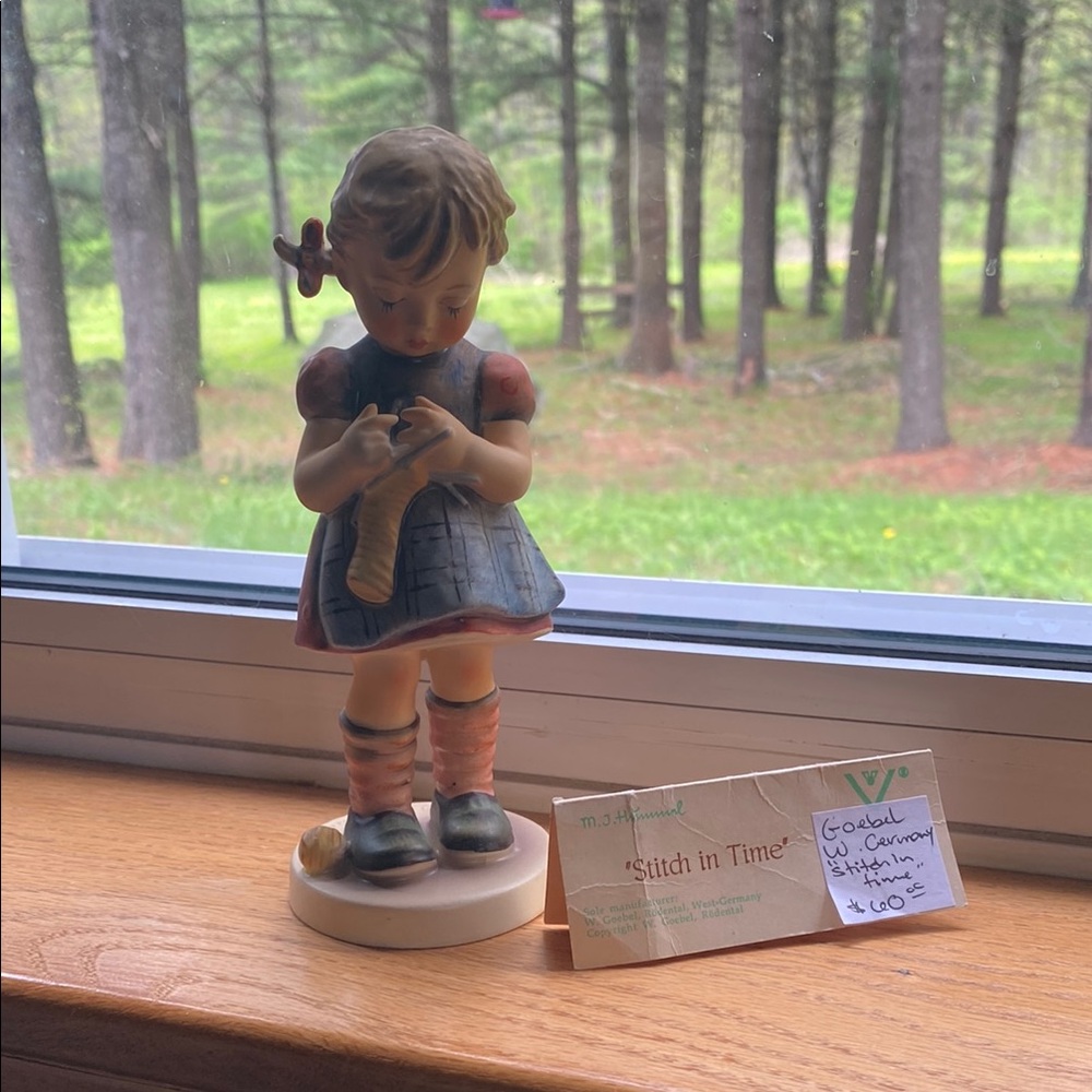 Hummel  “stitch in time” Girl Figurine in Red and Blue